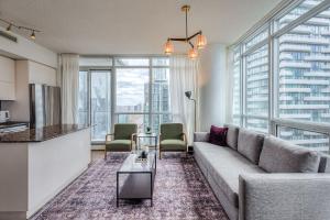 Downtown 2BR condo with city views and free parking