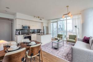 Downtown 2BR condo with city views and free parking