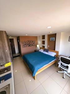 S06 SUITE KING Premium Suite TEC CEM con Cocineta WiFi Balcón Parking Terraza