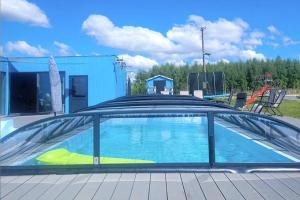Two-story holiday homes, summer pool, sauna