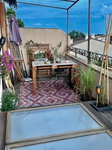 Appartement en duplex avec terrasse sur toit