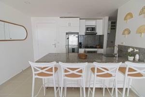 Beachfront Luxury 2BR - Pool, Balcony & Ocean Vie