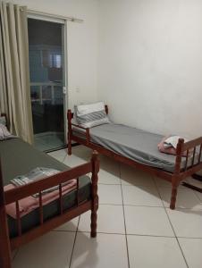 Apartamento 2 quartos 2 banheiros e churrasqueira a carvão