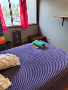 Habitación compartida en casa de familia
