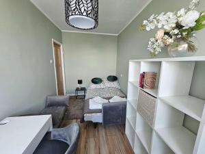Cozy Apartment with a Balcony Near the Center and PGE Stadium by Noclegi Renters