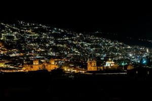 Inti Qhawa with views of the Andes in Historic Center