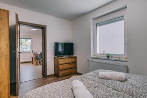 Malomfészek Apartman