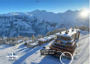 ARC 1600, LE RIDGE, Appartement 12 personnes Vue Montagne - ski aux pieds - Sauna, Hammam, Piscine chauffée, Salle de salle de sport-fitness