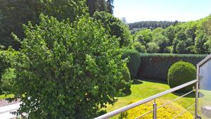ANTHELIA Ferienwohnung Nähe Nürburgring Eifel ruhige Lage mit großem Garten
