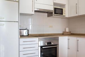 Global Vacacional, Atico en la playa de Canet con gran terraza