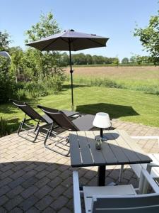 Tiny Natuurlodge voor 2 personen met vrij uitzicht over landerijen