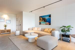 Luxury 3-Bed Penthouse Retreat with Sea & Golf Views