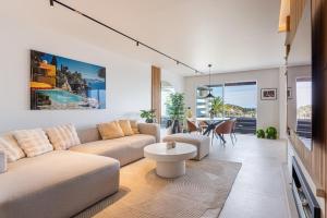 Luxury 3-Bed Penthouse Retreat with Sea & Golf Views