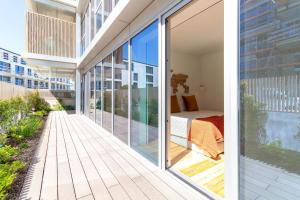 Coastal Bliss Stylish 2BR Apartment by LovelyStay