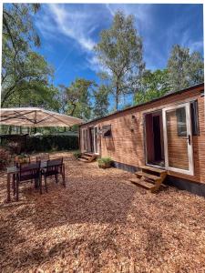 Atara Abode - Chalet voor 4 personen bij De Hoge Veluwe met tuin