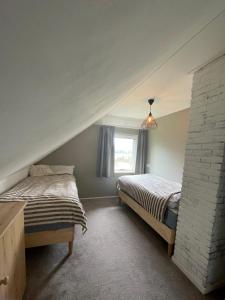 Koggel & Cottage -sfeervolle cottage met houtkachel & fiets oplaadpunt
