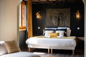 Refuge Tropical - suite pour couple avec balnéo 2 places et Cinema géant
