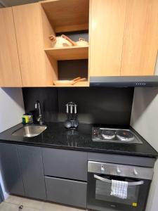 Apartamento a pasos del Movistar Arena - primer piso del edificio
