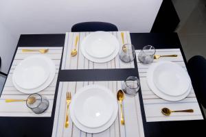Modern 2BR Home Near Padre Pio SM & S&R with Parking