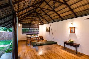 ELIVAAS Signature Tales By Tamarind 200 Year-Old 3 BHK Forest Villa with Pvt Pool, Garden, Gazebo, Backyard & Open-Air Shower Courtyard
