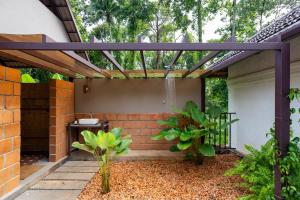 ELIVAAS Signature Tales By Tamarind 200 Year-Old 3 BHK Forest Villa with Pvt Pool, Garden, Gazebo, Backyard & Open-Air Shower Courtyard