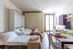 GuestHost - Bright Studio near Pisa Train Station