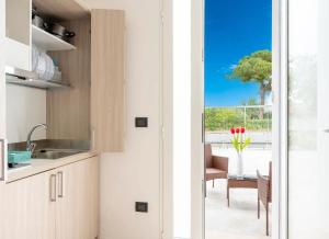 Monolocale Riva Wi-Fi, Clima e Giardino a Torre Lapillo