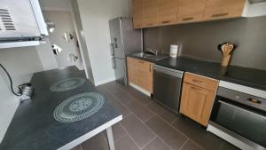 Appartement Proche centre Parc Spirou