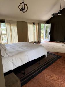 Safari Tent Glamping with Firepit & Screened Porch in Voluntown, Connecticut