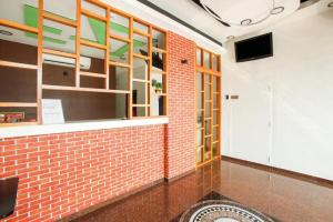 OYO 89407 EZI Hotel