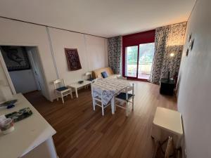 Trilocale con solarium e piscina