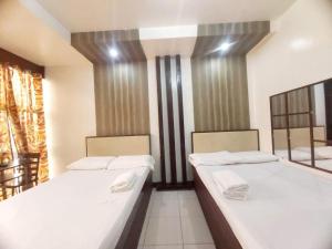 OYO 924 Cosmo Hotel Espana Near Ust
