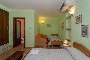 Elite Quadruple Room with Private Bathroom room in Il Ponte Affittacamere