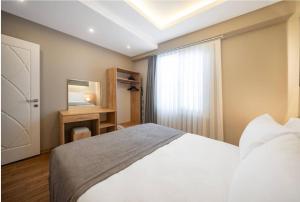 Taksim Square - 1BR Deluxe Suite 101