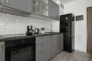 Comfortable Apartment for 4 Guests with Terrace, Garden and Projector by Noclegi Renters