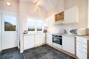 Holiday Home With A Spa And Sauna By The Water