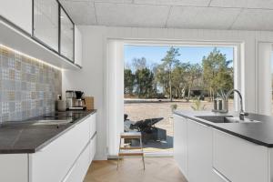 Modern Holiday Near Fjord And Beach