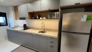 Apartamento novo ao lado do shopping, no centro