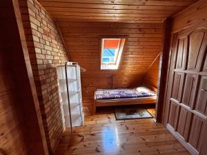 Domek widok na jezioro Marta Pierkunowo