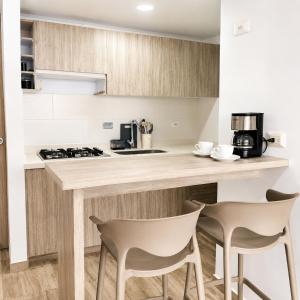 Apartamento con piscina a 15 minutos del parque del cafe