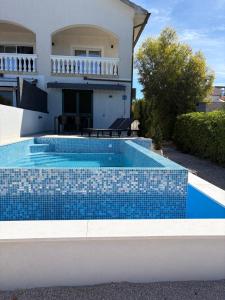 Apartment Lydia with private pool on the beach