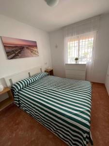 Bungalow moderno con amplio patio junto al mar