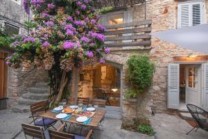 Charming Stone House with Green Courtyard