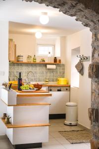 Charming Stone House with Green Courtyard