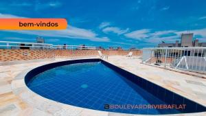 Flat lindo a 120 metros da praia de Riviera de São Lourenço até 4 pessoas