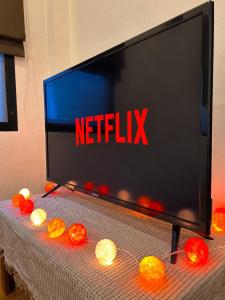 Tropical Haven House Pool Fiber Smart TV