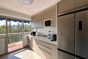 Marina view apartment terrace & pool