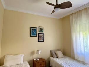 Villa con jardín en Oliva Nova Golf a 100m de la playa