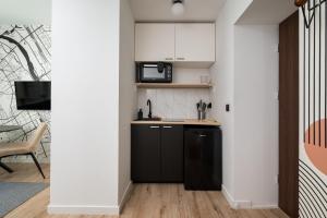 Chmielna Heart of Warsaw Chic Apartment by BookingHost