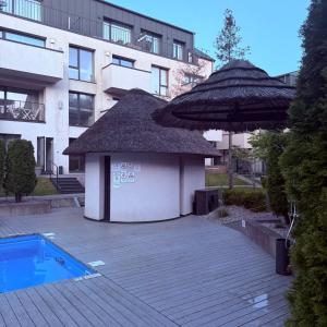 Apartamentai prie baseino